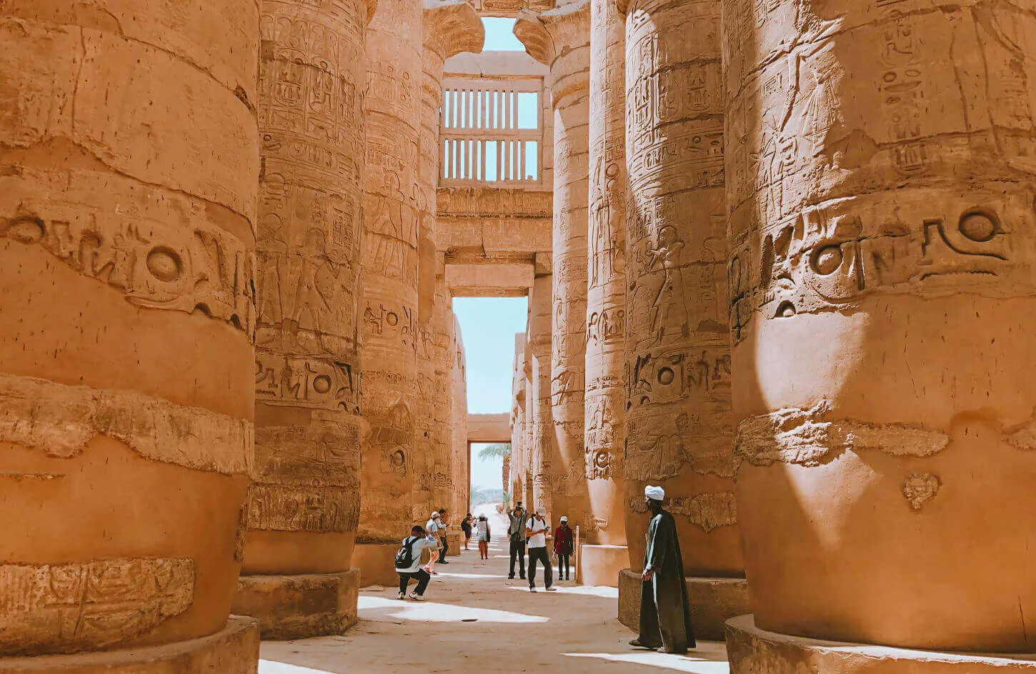 A-picture-of-some-visitors-near-the-columns-of-Karnak-Temple.jpg