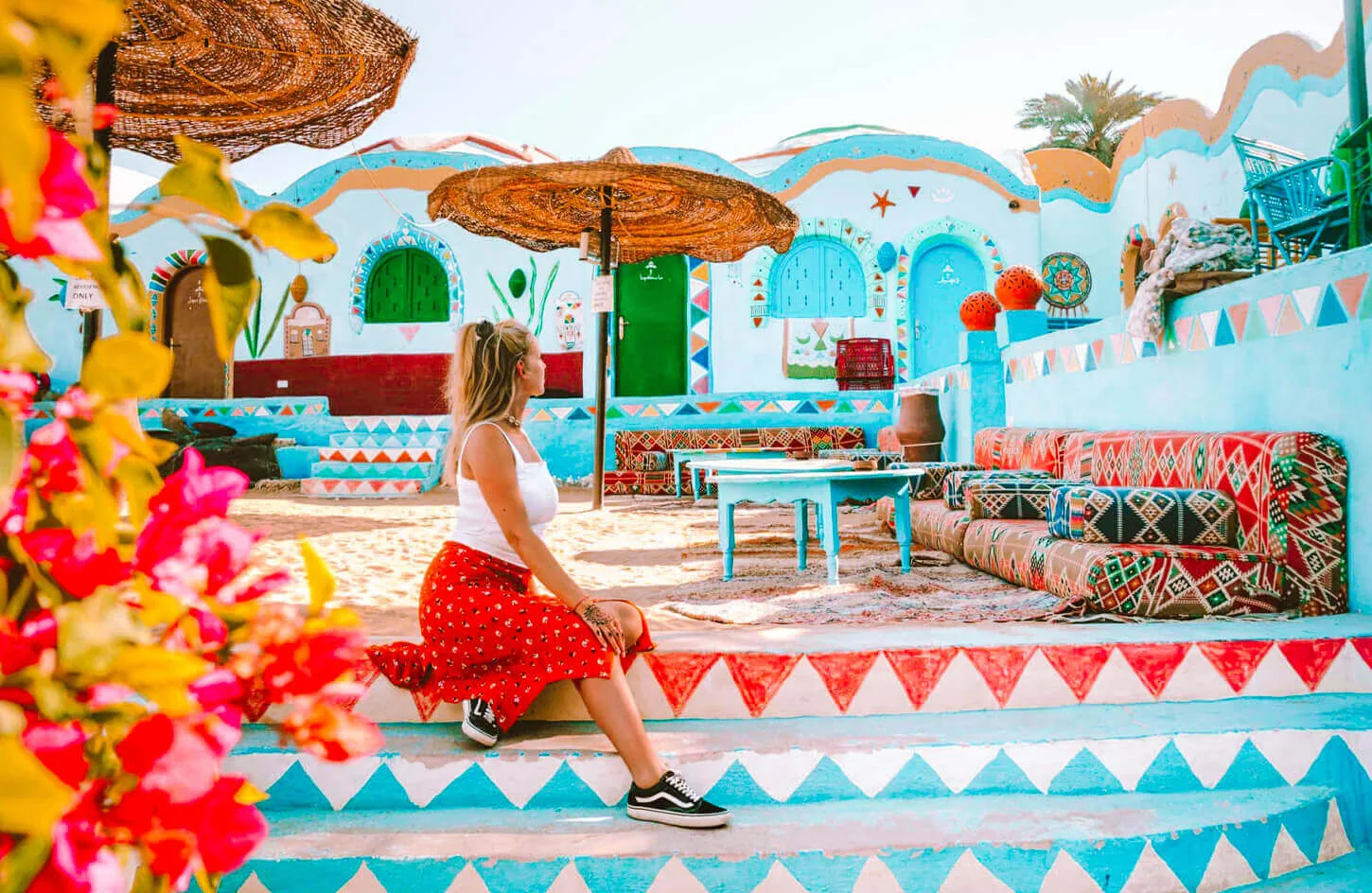A-tourist-enjoys-sitting-in-the-Nubian-village.jpg
